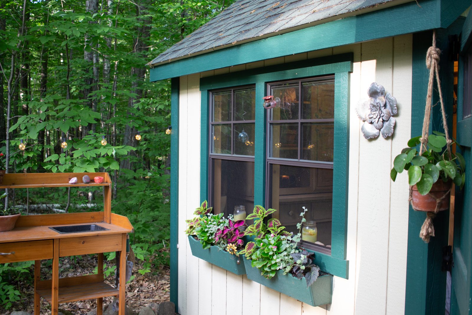 flower boxes on she shed northern wisconsin